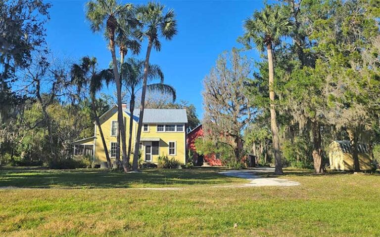 yellow historic house in park area at gemini springs park debary