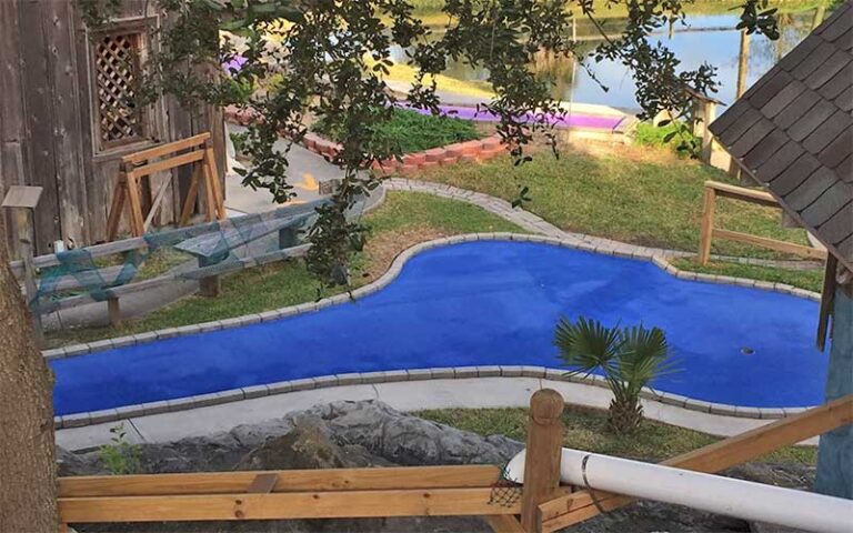 bright blue putting green with mining theme at anastasia miniature golf st augustine