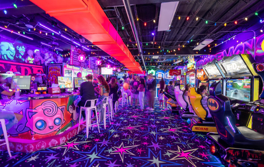 colorful arcade center with neon and blacklight effects arcade monsters lido beach sarasota