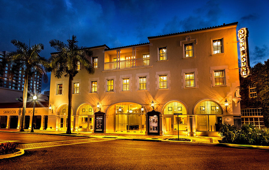 night exterior of lighted theater building sarasota opera house