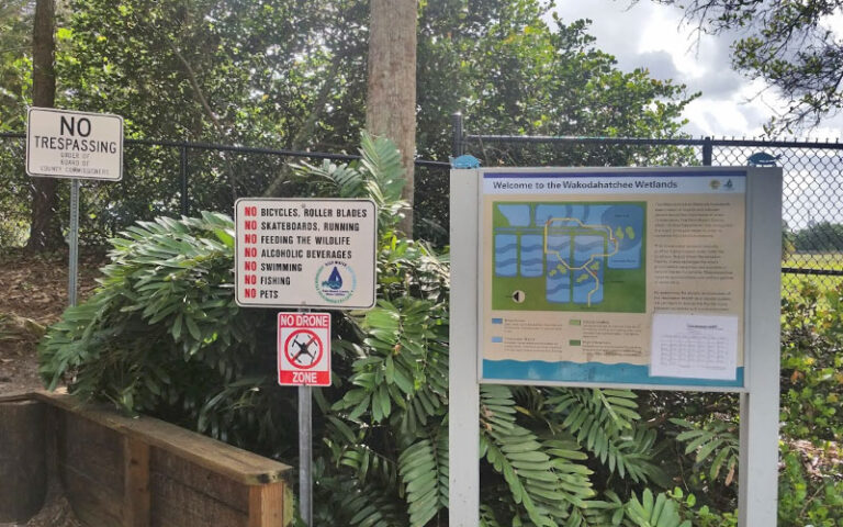 park signs with map and warnings at wakodahatchee wetlands delray beach