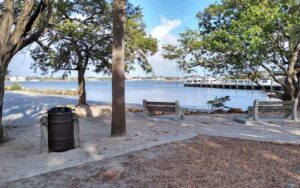 shady park area with marina and picnic tables at ocean inlet park boynton delray beach