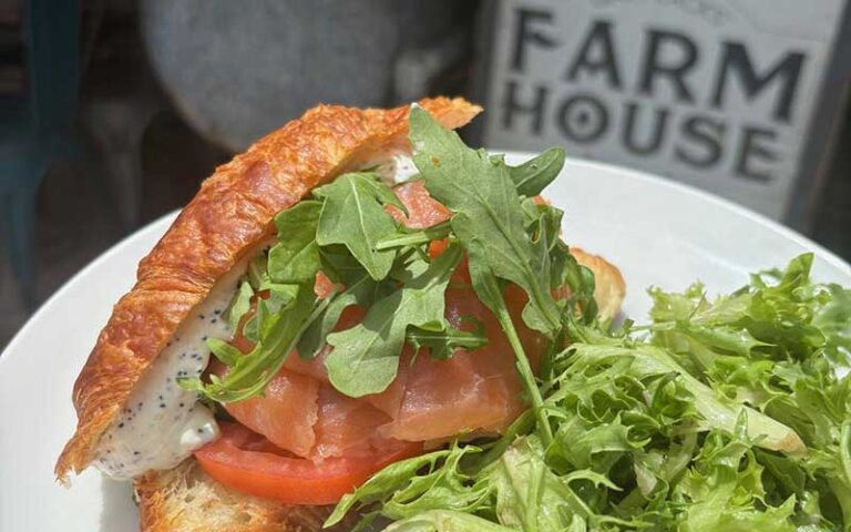 croissant with lox and greens at gary racks farmhouse kitchen delray beach