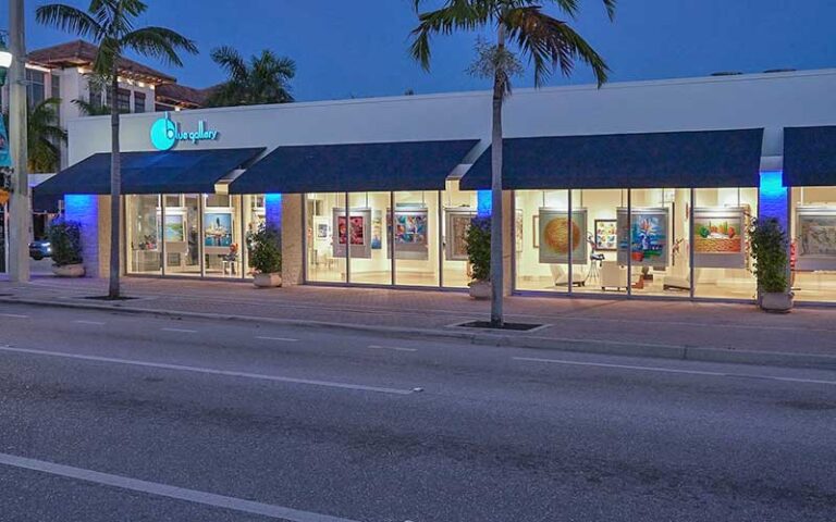 night exterior of gallery from street with lighting at blue gallery delray beach