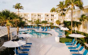 pool area with hotel and clubhouse at delray sands resort highland beach