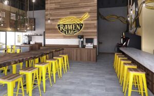 restaurant interior with sign and bar seating at ramen lab eatery delray beach