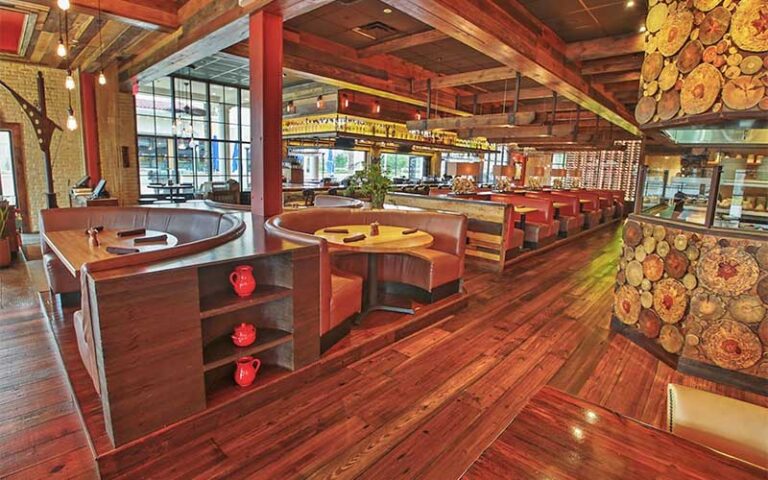 rustic woodsy dining room interior with booths at burt maxs delray beach