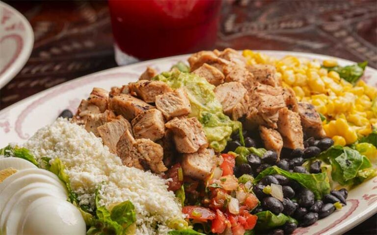 salad platter with chicken corn quac eggs feta at roccos tacos tequila bar delray beach