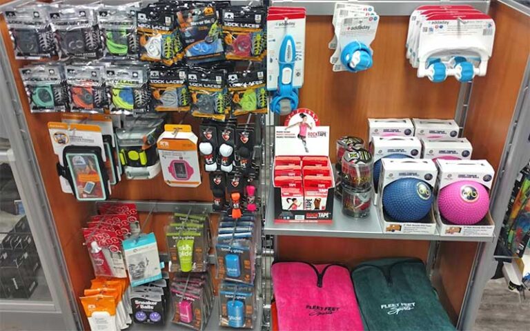 shelf of sports accessories at fleet feet delray beach