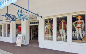 store front along sidewalk with entrance at south ocean beach shop delray beach