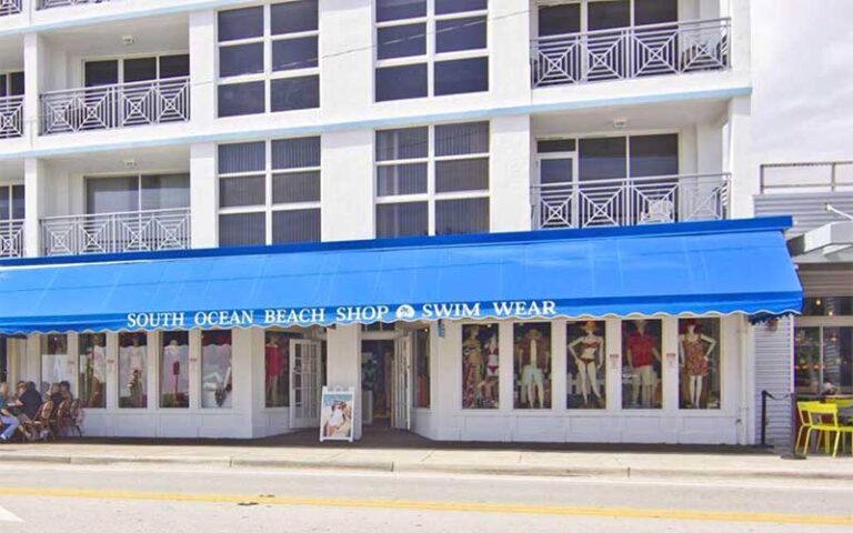 street exterior view of storefront with blue awning at south ocean beach shop delray beach