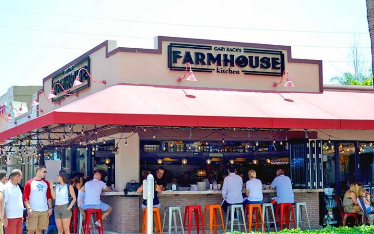 street exterior view with sidewalk seating at gary racks farmhouse kitchen delray beach