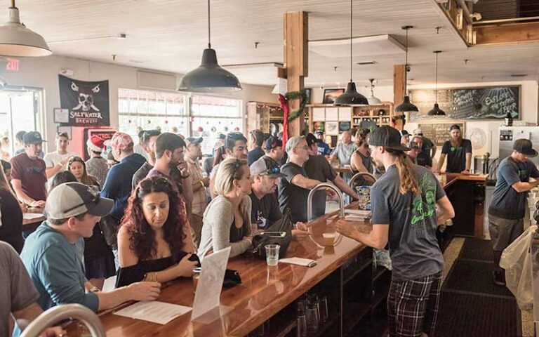 tasting tour in crowded bar at saltwater brewery delray beach