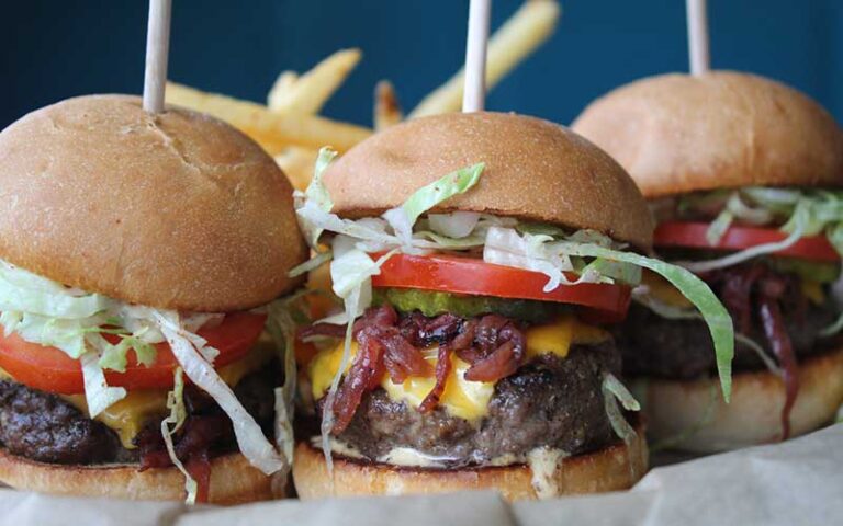 three mini cheeseburgers with fries at johnnie browns delray beach