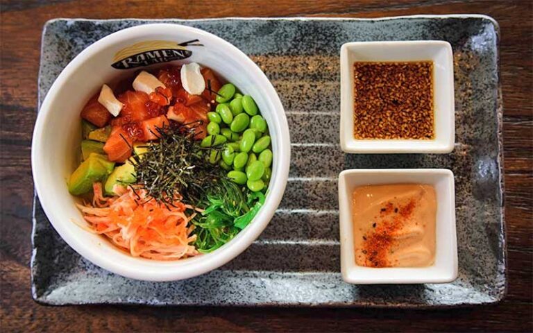 tray with poke bowl and sauces at ramen lab eatery delray beach