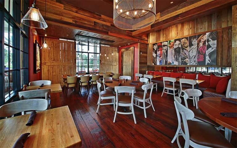 wooden dining interior with music mural at burt maxs delray beach