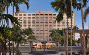 high rise hotel exterior with sunset lighting at boca raton marriott at boca center