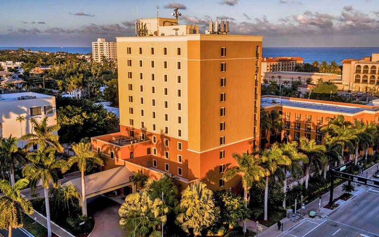 high rise hotel with ocean view blocks behind at the atlantic suites on the ave delray beach