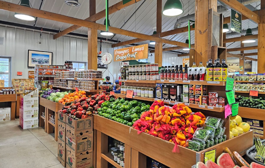 indoor produce market with vegetables at bedners farm fresh market delray beach