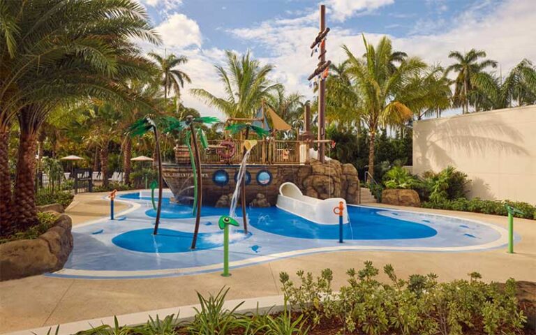 kids splash pad with pirate ship play area at beach club at the boca raton