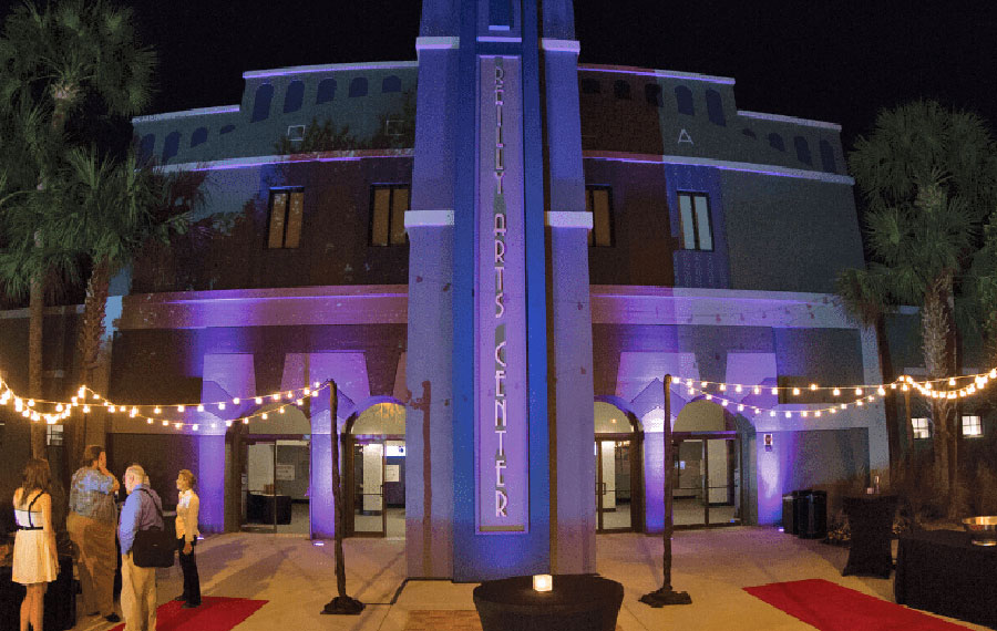 night exterior with lighting and patrons at reilly arts center ocala