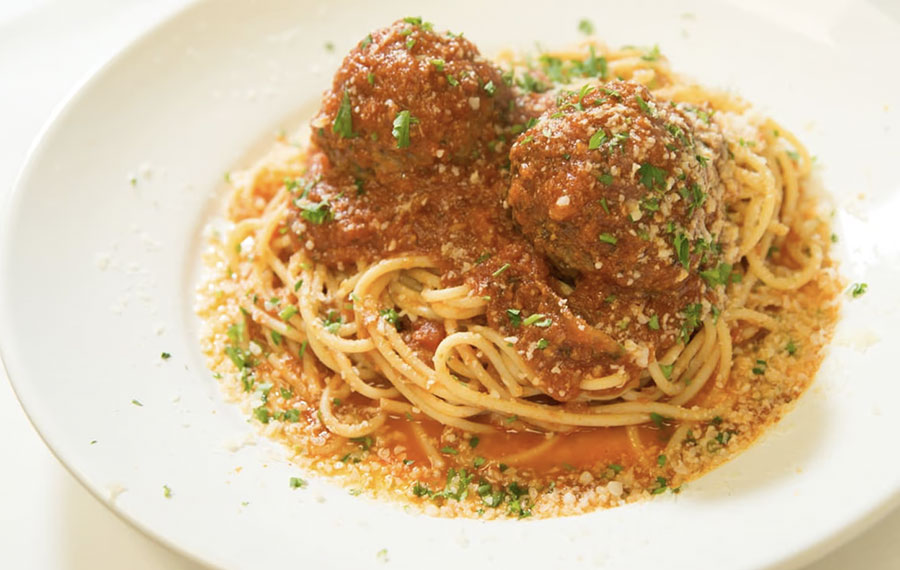 spaghetti with meatballs on white plate at mesa de notte ocala