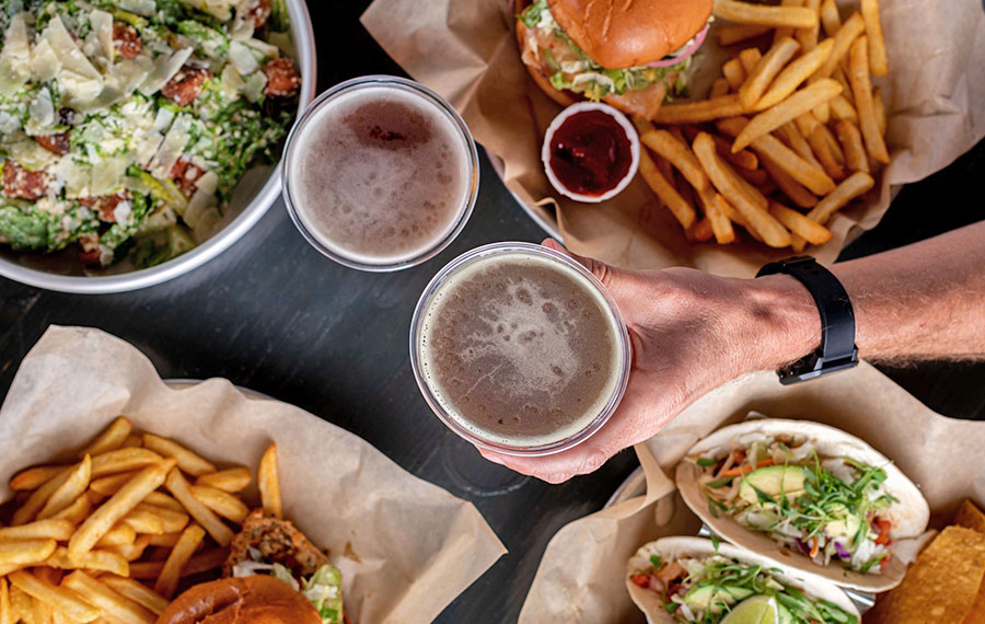 view from above of table with entrees and drinks at johnnie browns delray beach