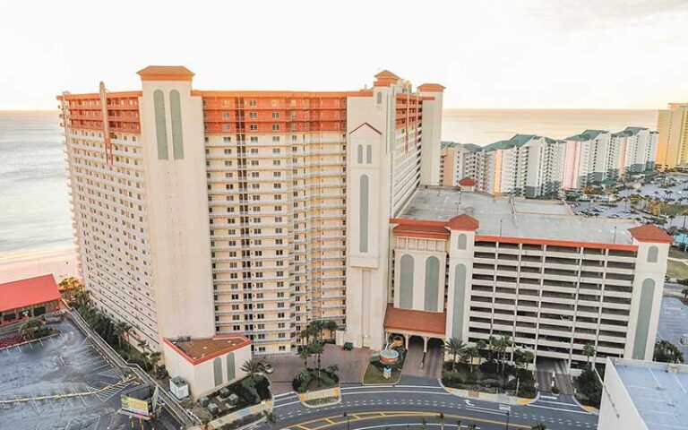 aerial view of high rise resort complex with beach at shores of panama city beach