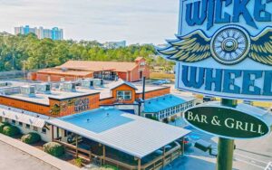 aerial view of restaurant with sign at the wicked wheel panama city beach