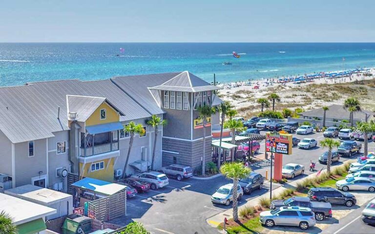 aerial view of two story restaurant with beach at runaway island panama city beach