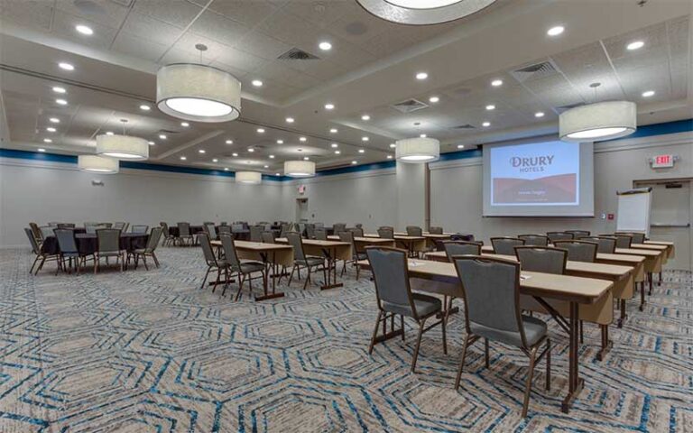 conference room with projector and seating at drury inn suites gainesville