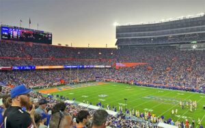 crowded stadium with night football game at ben hill griffin stadium gainesville