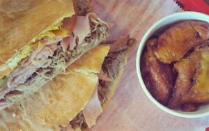 cuban sandwich with side of maduros at flacos gainesville