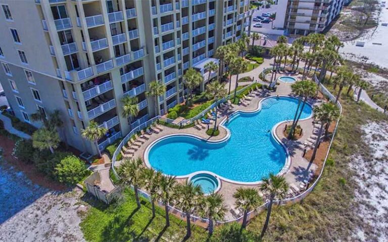 curvy beachfront pool with hot tubs at grand panama beach resort by emerald beach resorts