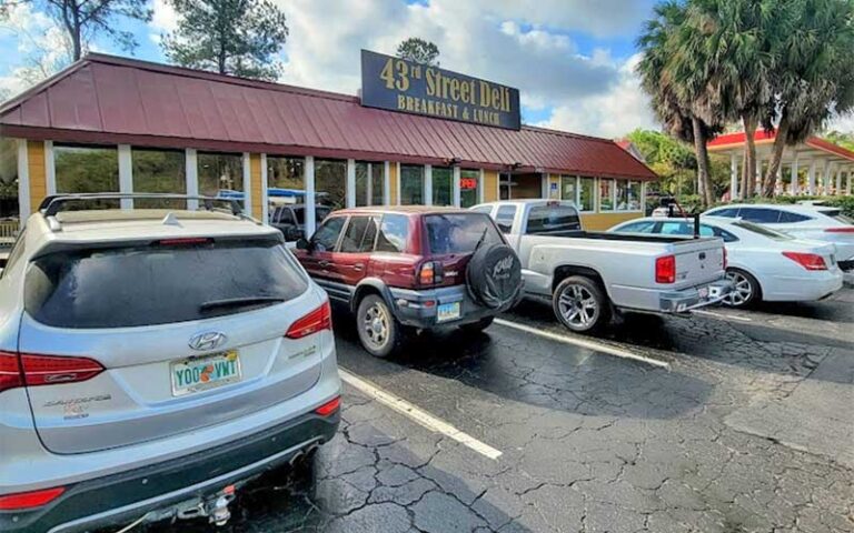 daytime exterior of diner with cars parked at 43rd street deli breakfast house gainesville