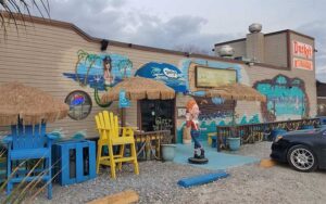 daytime exterior of restaurant with parking at dustys oyster bar panama city beach