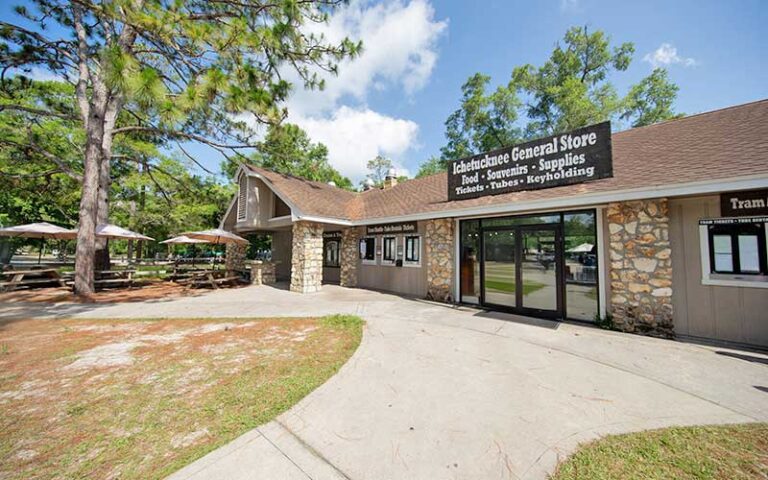 daytime exterior visitor center store with picnic tables at ichetucknee springs state park gainesville