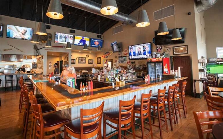 dining area with large bar at dat cajun place cafe panama city beach