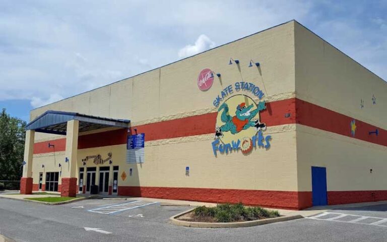 exterior of building with parking and entrance at skate station funworks gainesville