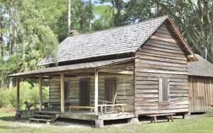 exterior of historic cabin home with porch at morningside nature center gainesville