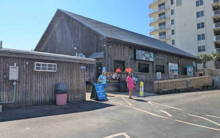 exterior of restaurant and parking with ramp at pineapple willys panama city beach