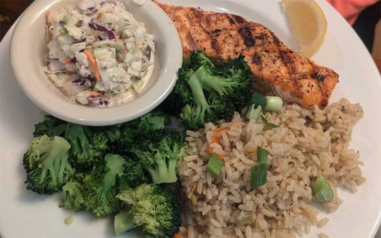 fish steak with broccoli and sides at northwest grille gainesville