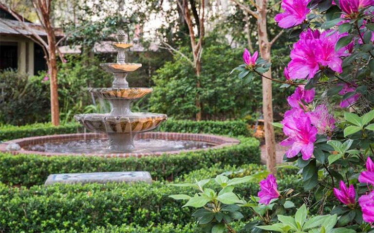 garden fountain with azaleas at magnolia plantation bed breakfast inn gainesville