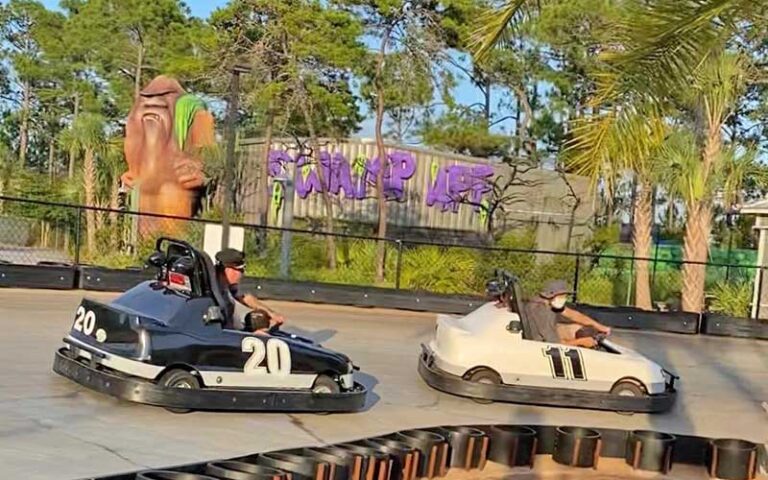 go karts speeding around a track at swampy jacks wongo adventure panama city beach