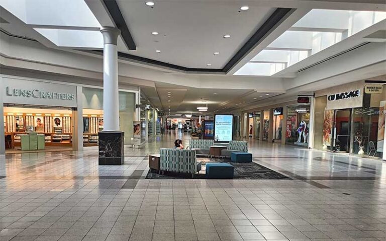 indoor hallway of shopping area with columns at the oaks mall gainesville