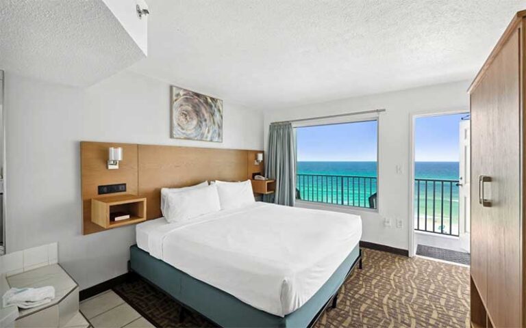 king bed suite with balcony ocean view at beachcomber beachfront hotel panama city beach