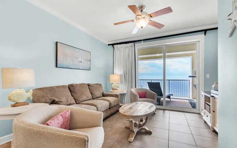 living room suite with balcony at grand panama beach resort by emerald beach resorts