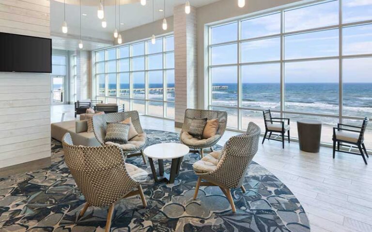 lobby with ocean view and seating at springhill suites panama city beach beachfront