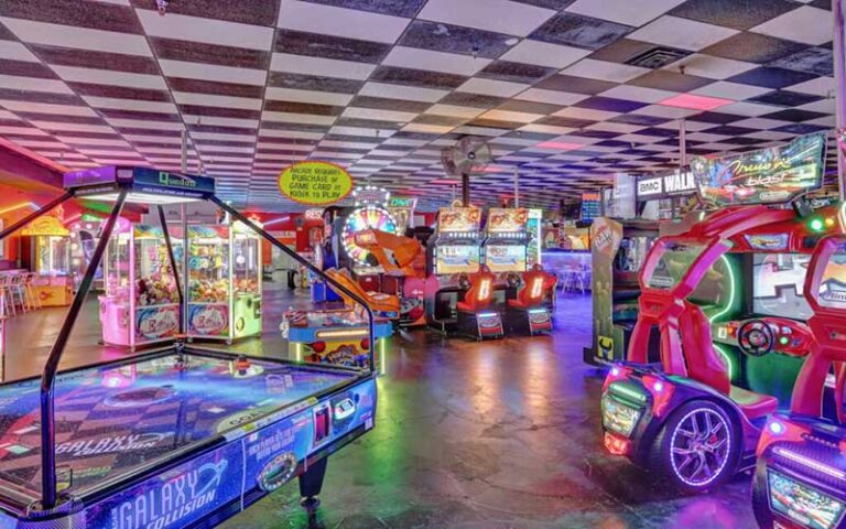 neon lit arcade with air hockey at rockit lanes panama city beach