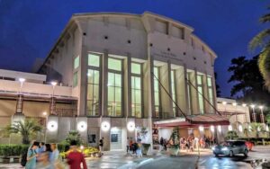 night exterior of theater with drop off at curtis m phillips center for the performing arts gainesville